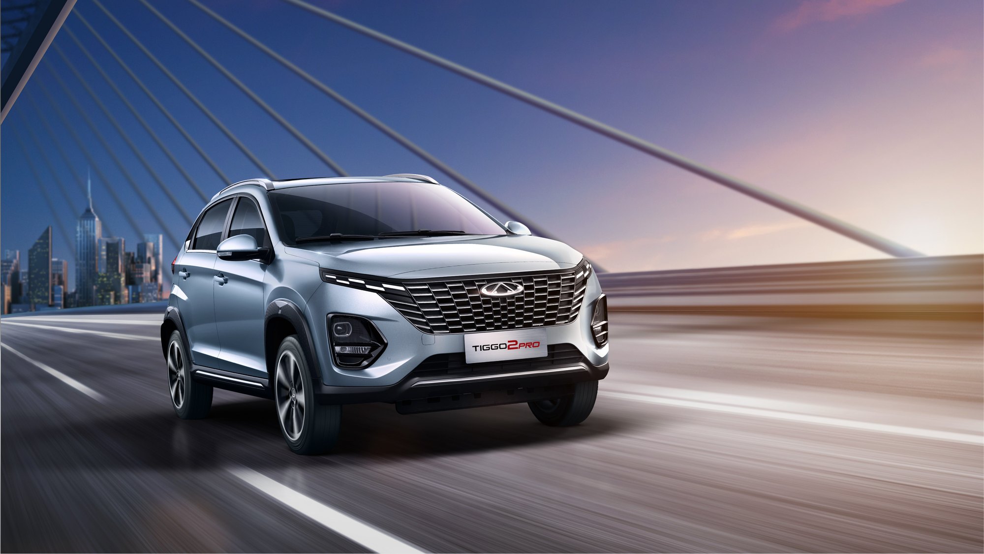 Chery Tiggo 2 Pro compact SUV in silver on the open road